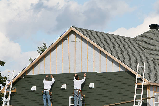 Professional Siding Repair technician working in Long Beach, NY